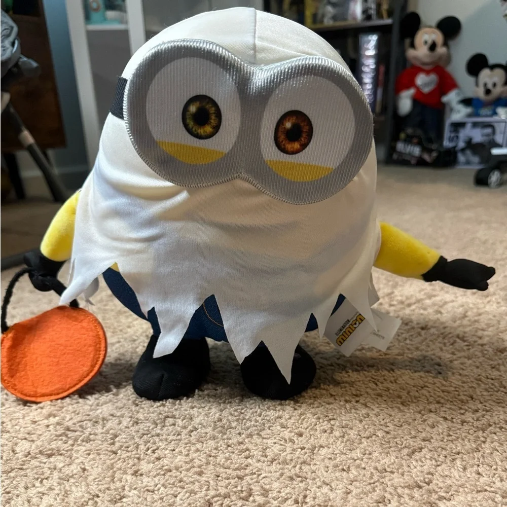 Minion plush toy dressed as a ghost for Halloween